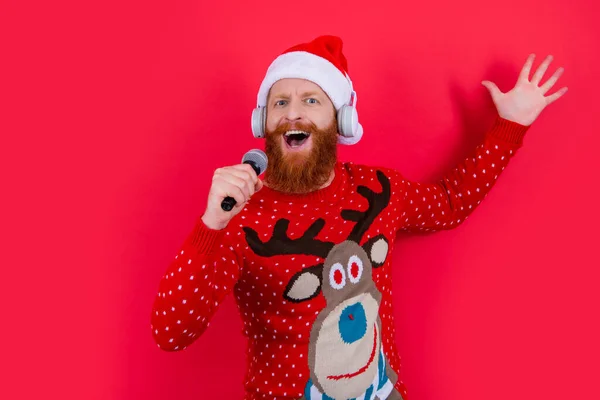 Happy Bearded Man Santa Hat Singing Mic Studio Isolated Red — Stock Photo, Image