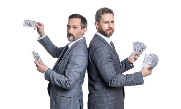 stock image businessmen holding money earning in studio. businessmen hold money dollar earning. photo of businessmen hold money earning. businessmen hold money earning isolated on white background.