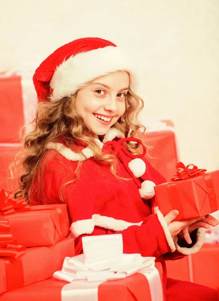 Girl celebrate christmas open gift box. Opening christmas gift. Kid happy with christmas present. Santa bring her gift. Happy new year concept. Unpacking christmas gift. Winter holiday tradition.