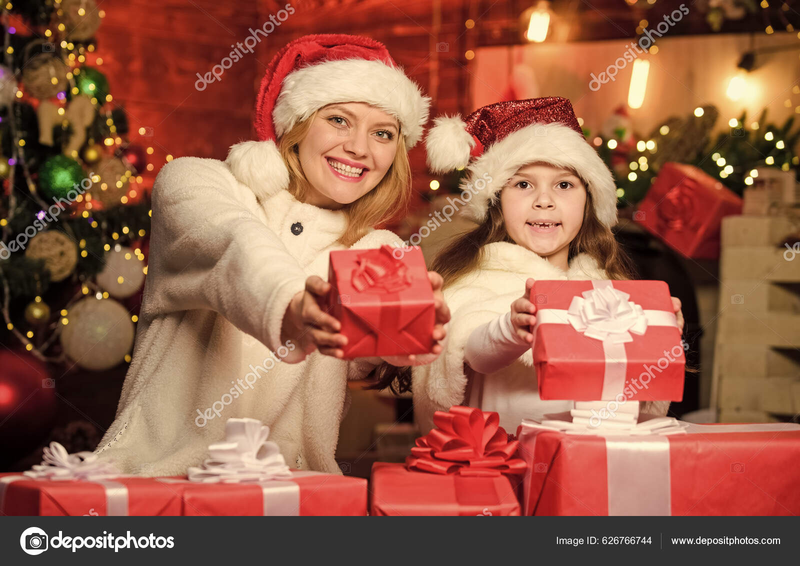 https://st5.depositphotos.com/2760050/62676/i/1600/depositphotos_626766744-stock-photo-gifts-girls-mom-child-gift.jpg