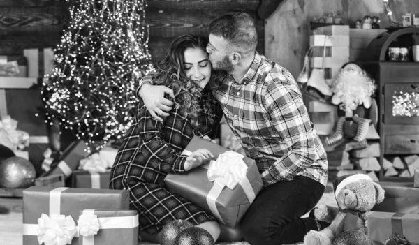 Happy woman and man. Holiday gift. Holiday mood. Couple in love making surprise for each other. Family time. Happiness and joy. Best holiday. Christmas time. Celebrate new year at home. Spread love.