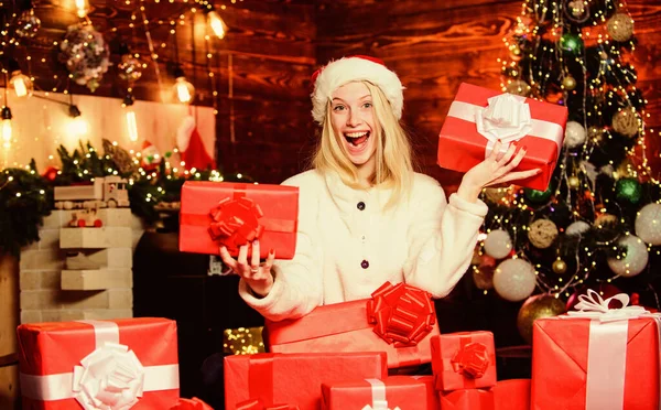 Thrilling emotions. Happy smiling woman and gift box. Boxing day. Cozy home. Happy moments. Happiness and joy. Festive mood. Present concept. New year is coming. Merry christmas and happy new year.
