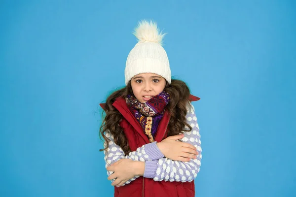 Winter flu. feeling cold this season. Dress in layers and wear hat. Stay active. it is cold outside. kid warm knitwear. winter vibes. Portrait of girl hipster. Youth street fashion. Feeling cozy.