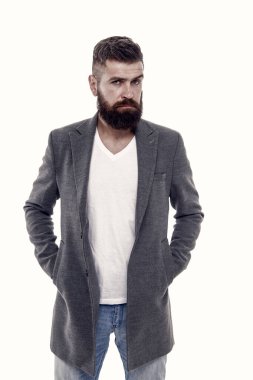 Vahşi sakalın sahibi. Vahşi görünümlü beyaz bir adam. Sakallı, bıyıklı, sakallı, sakalsız, vahşi yüzlü bir adam. Gayri resmi giyinen vahşi bir hippi..