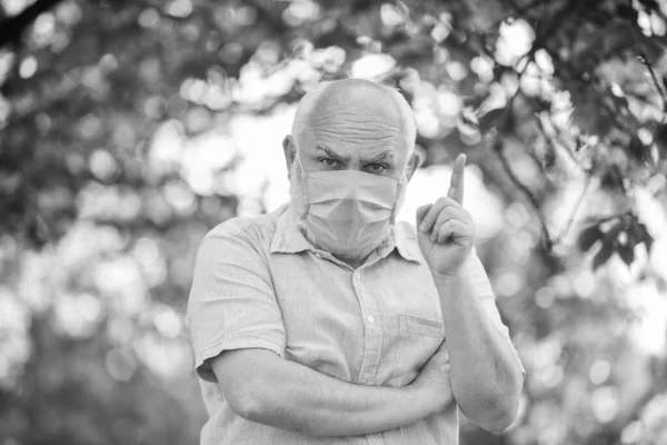 Mask protecting from virus. Wear mask. Elderly and other risk groups. Pandemic concept. Limit risk infection spreading. Senior man wearing face mask. Older people at highest risk from covid-19.