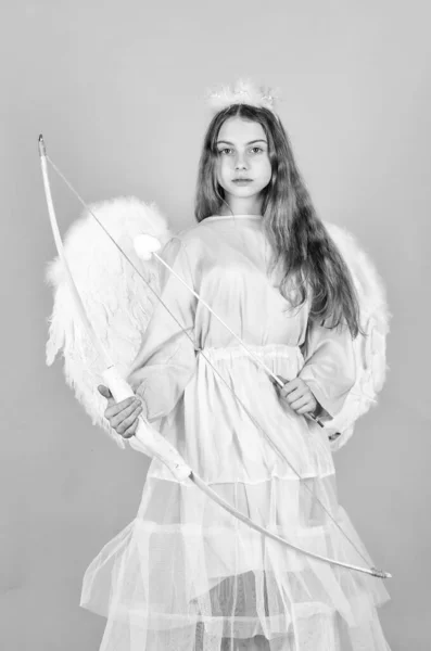 Romantic mood. God of love. February 14. valentine sale and discount. Cupid shoot with bow. Arrow of love. small angel girl with wings and halo. Cupid arrow with bow. Valentines day angel. Amour.