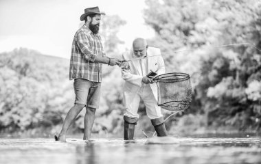 Yeni yetenekler. Hobi ve eğlence. Başarı. Balıkçılar. İyi yakaladın. Fisher emekliliği kutluyor. İyi prodüksiyon. Emekli işadamı. Erkek arkadaşlığı. İyi kar. Dedem ve Drandson balık tutuyor..