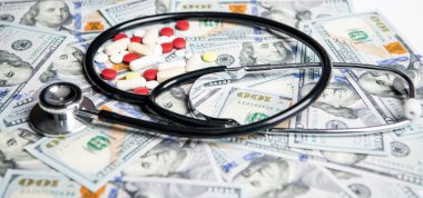 money for medicine expenses in selective focus. medicare payment. stethoscope of medicine expenses closeup. photo of medicine expenses currency. medicine expenses concept. clipart