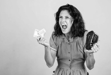 Shopaholic. economy and crisis concept. Female housewife has financial problem. girl need loan or credit. income planning. angry woman hold wallet with money. shopper girl save budget.