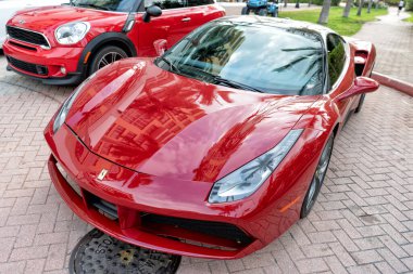 Miami Beach, Florida USA - April 18, 2021: red Ferrari 488 GTB, high view.