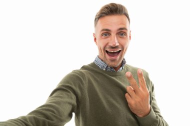 selfie man blogging isolated on white. selfie man blogging in studio. selfie man blogging on background. photo of selfie man blogging, peace.
