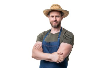 smiling caucasian gardener in hat and apron isolated on white background.