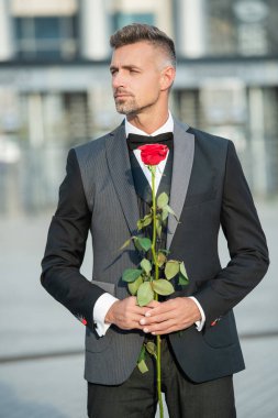 proposal concept. black tuxedo man prepare for proposal. man before romantic proposal.