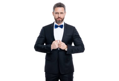 man in tuxedo isolated on white background. tuxedo man in studio. photo of man wearing tuxedo. man wear tuxedo formal suit.