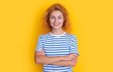 cheerful redhead woman face isolated on yellow background. face of young redhead woman in studio. adult redhead woman face.