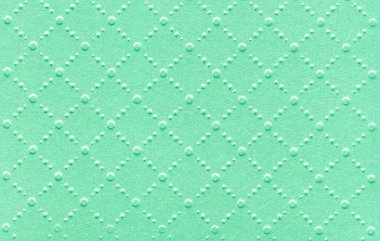 embossed green textured background. embossed green backdrop. background in embossed green color. embossed green backdrop texture.