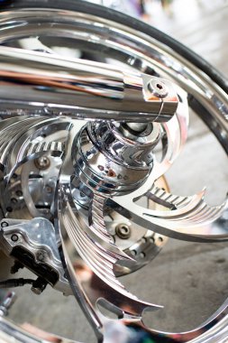 metallic custom wheel with chrome spokes detail of custombike motorcycle or chopper bike.