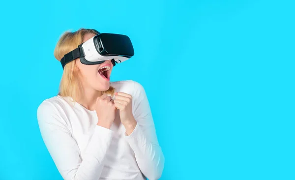 3d technology, virtual reality, entertainment, cyberspace and people concept. Happy woman exploring augmented world, interacting with digital interface. Virtual reality experience