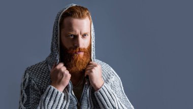 brutal man in winter fashion at studio banner. brutal man in winter fashion on background. photo of brutal man in winter fashion. brutal man in winter fashion isolated on grey.