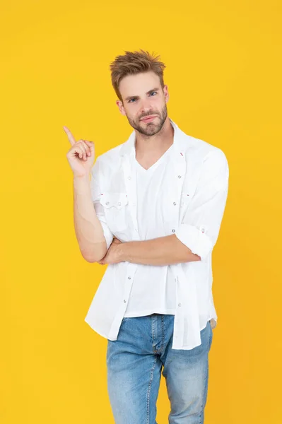 caucasian handsome man with stubble isolated on yellow. handsome man with stubble in studio. handsome man with stubble on background. photo of handsome man with stubble hair.