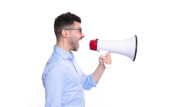 shouting man profile announcing with megaphone. photo of man announcing with megaphone. man announcing with megaphone isolated on white background. man announcing with megaphone in studio.