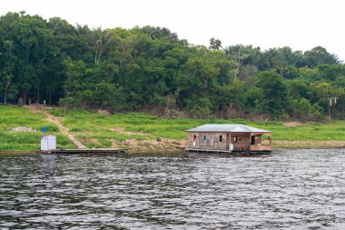 riverside bungalow house outdoor. riverside bungalow house outside. riverside bungalow house at the forest. photo of riverside bungalow house.