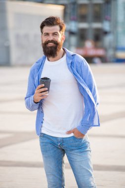 happy guy at coffee break in the street. photo of guy at coffee break. guy at coffee break outdoor. guy at coffee break outside.