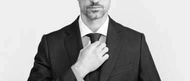 mature man in formal suit wear spectacles.