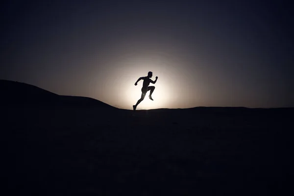 Silhouette Running Man Sunset Fiery Sky Background Mountain Sport Recreation — Stock Photo, Image