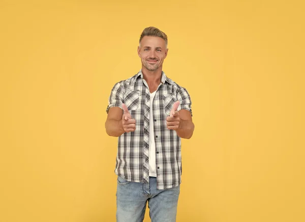 Happy Mature Man Grizzle Hair Yellow Background Pointing Finger — Foto Stock
