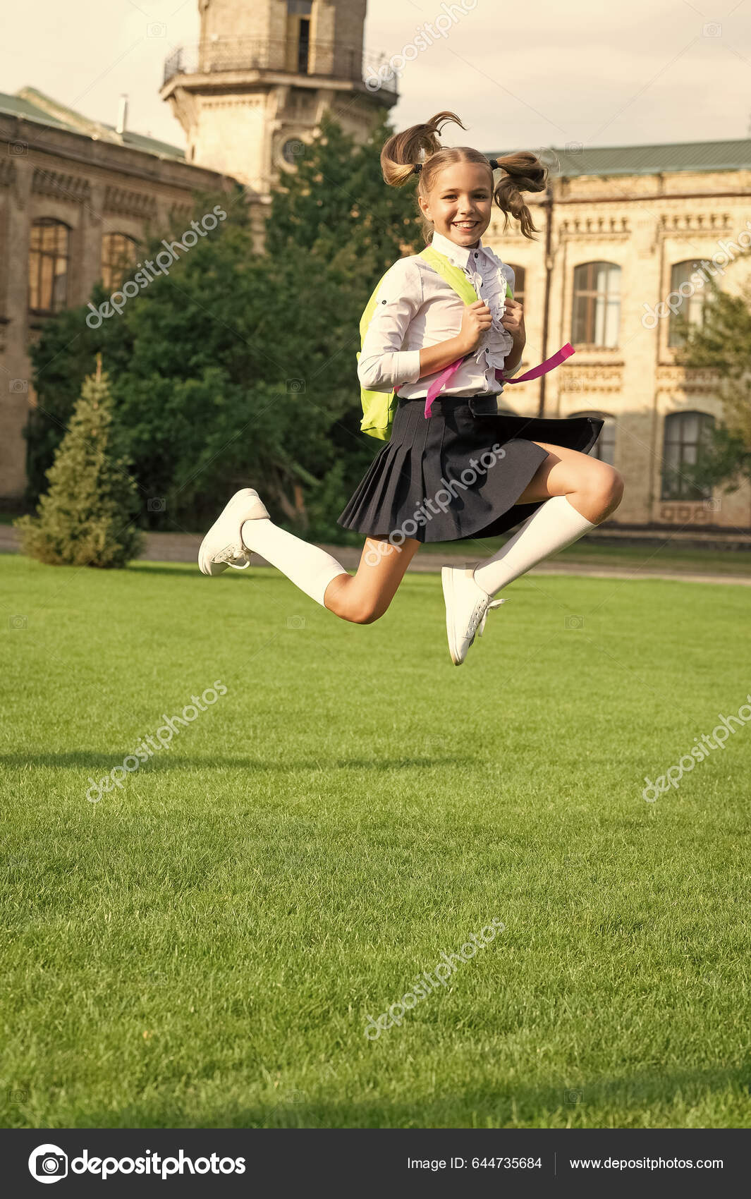 A Happy Young Baby Infant Jumping For Joy Stock Photo, Picture and