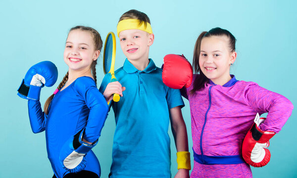 Girls kids with boxing sport equipment and boy tennis player. Ways to help kids find sport they enjoy. Sporty siblings. Friends ready for sport training. Child might excel completely different sport.