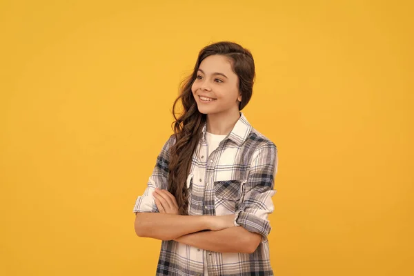 Cheerful Teen Girl Checkered Shirt Long Curly Hair Yellow Background — Fotografia de Stock