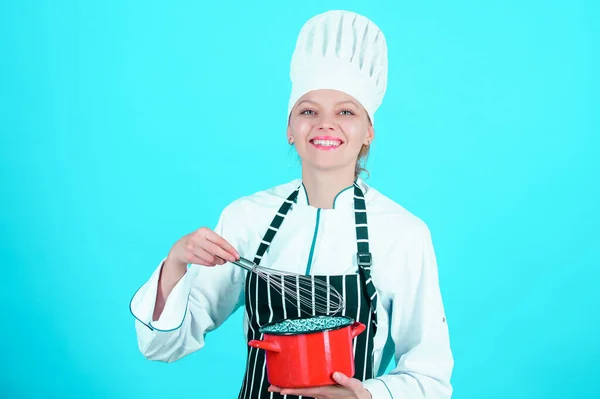 Whipping cream tips and tricks. Woman professional chef hold whisk and pot. Whipping like pro. Girl in apron whipping eggs or cream. Start slowly whisking whipping or beating cream. Use hand whisk.