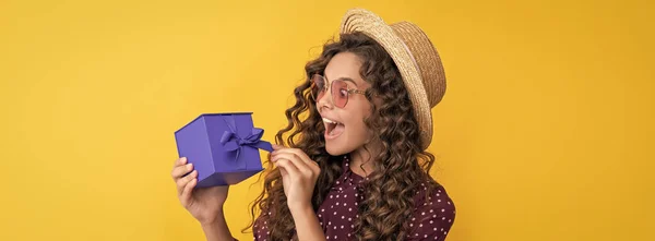 Amazed Kid Curly Hair Hold Present Box Yellow Background —  Fotos de Stock