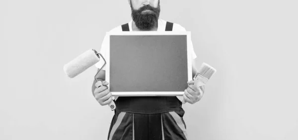 Cropped Man Renovator Work Clothes Hold Paint Roller Brush Blackboard — Foto de Stock