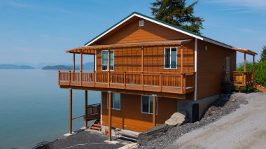 Manzara evinde dinlenme. Manzara evi kahverengisinde eğlence. Alaska 'daki Manzara Evi' nde dinlenme. Manzara evinde fotoğraf üzerine eğlence..