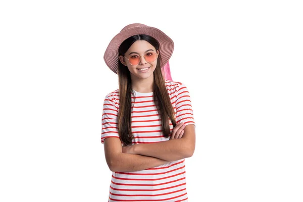 stock image summer vacation teen girl isolated on white. summer vacation teen girl on background. summer vacation teen girl in studio. photo of summer vacation teen girl wearing hat and stripe tshirt.