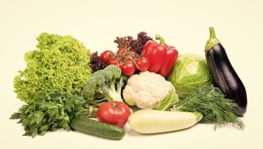 variety of fresh and ripe colorful vegetables isolated on white.