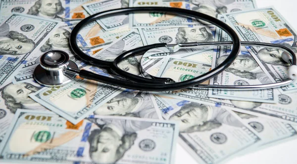 stethoscope of medicine expenses closeup. photo of medicine expenses currency. medicine expenses concept. money for medicine expenses in selective focus.