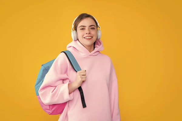 Happy Student Girl Headphones Backpack Yellow Background — Φωτογραφία Αρχείου