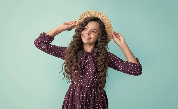 Cheerful Kid Straw Hat Long Brunette Curly Hair Blue Background — Foto Stock