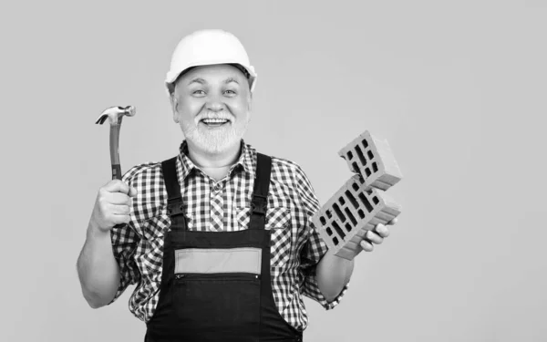 Happy Mature Man Worker Helmet Yellow Background — Stockfoto