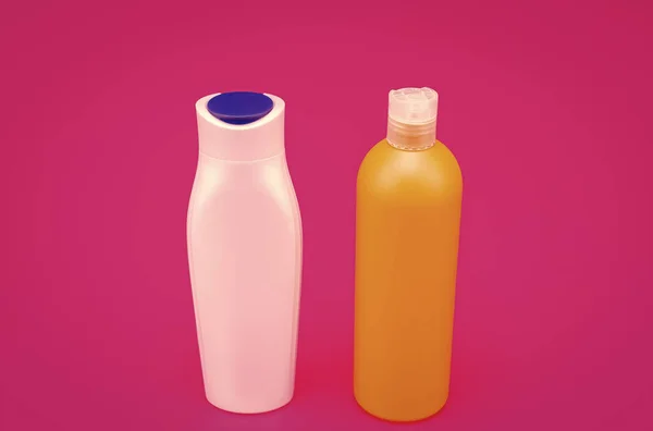 Przechowywania Dozowania Wielokolorowe Butelki Opakowaniowe Różowe Tło Hdpe Plastikowe Butelki — Zdjęcie stockowe