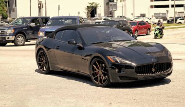 Miami Beach, Florida USA - April 15, 2021: black maserati gran turismo, corner view.