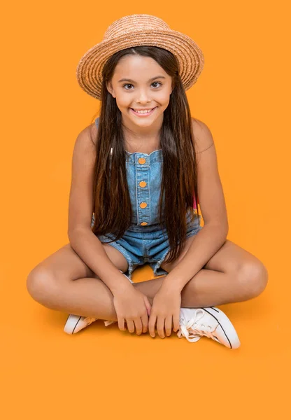 Positive Teen Girl Straw Hat Sitting Yellow Background — Foto Stock