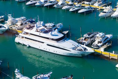 Miami Beach, Florida USA - March 23, 2021: luxurious boats in yacht port on summer.