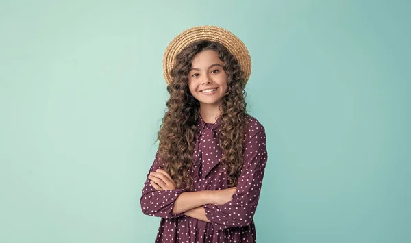 Cheerful Child Straw Hat Long Brunette Curly Hair Blue Background — Foto Stock