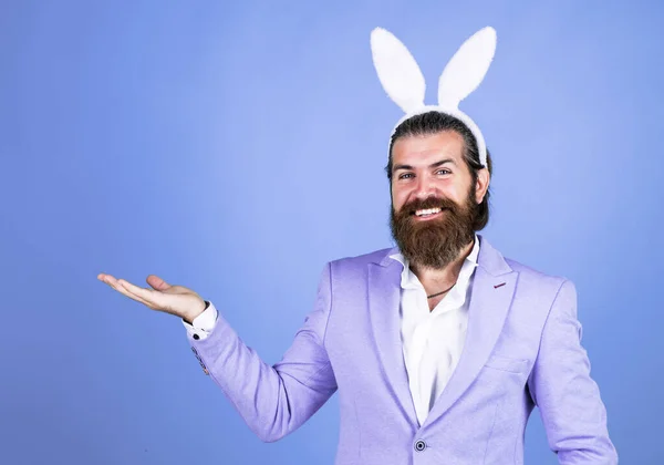 Man in bunny ears. rabbit man wear hare ears. bunny hunt begins. happy hipster with beard. Man in rabbit ears. Preparation for Easter. concept of egg hunt. Easter celebration concept. Spring holidays.