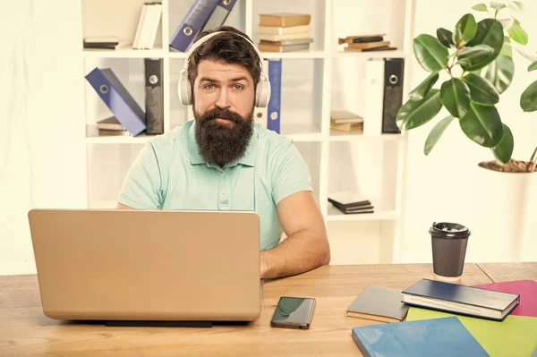 Serious Man Listening Webinar Headphones Using Laptop Office Online Education — Fotografia de Stock